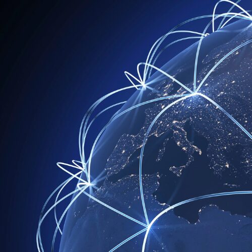 Earth from space at night with lines connecting different countries